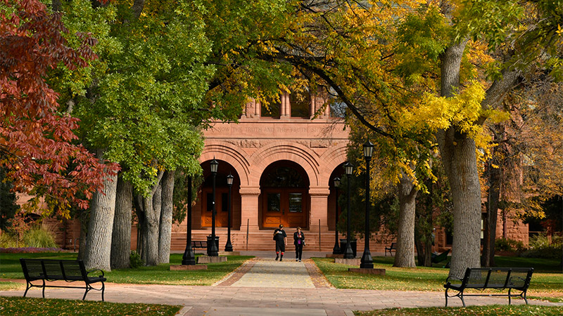 Outdoor photo of students on campus